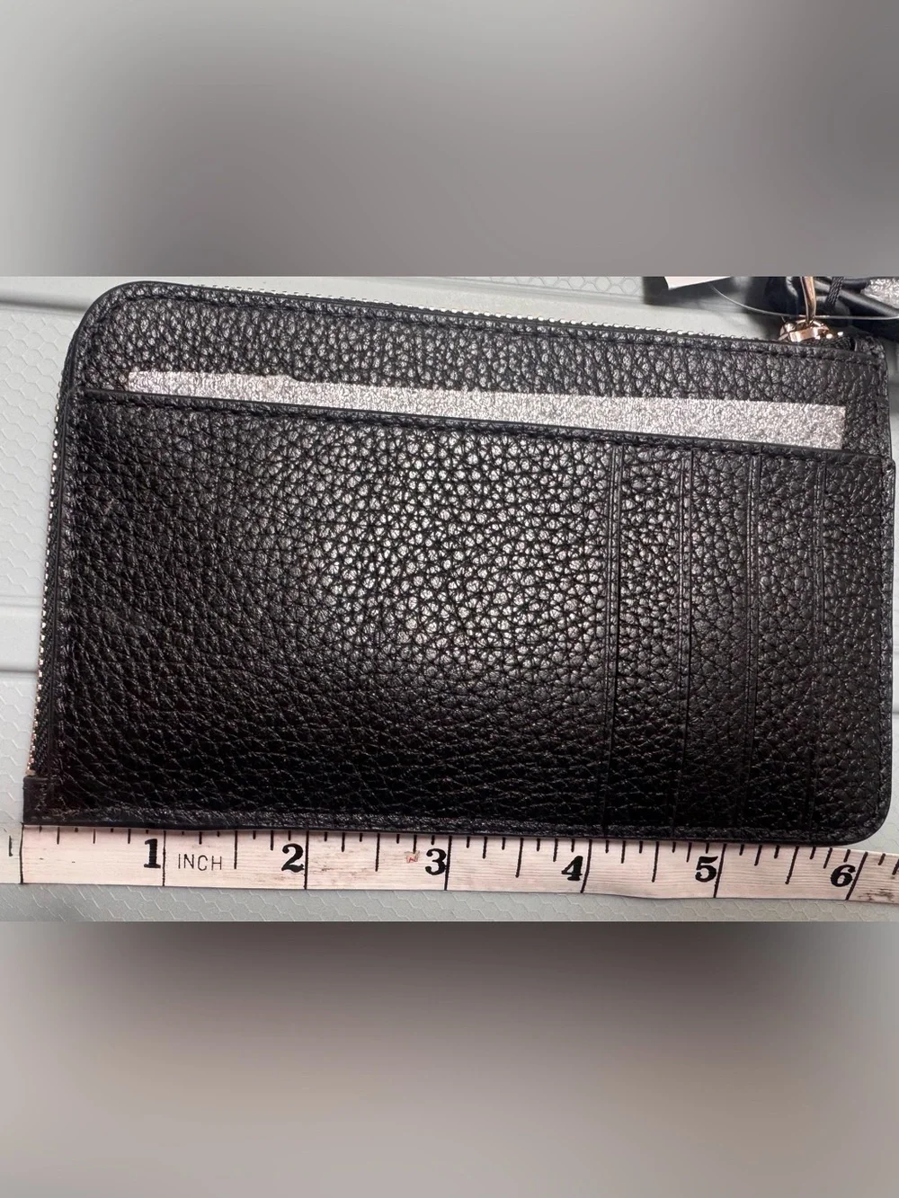 kate spade or zip scratches